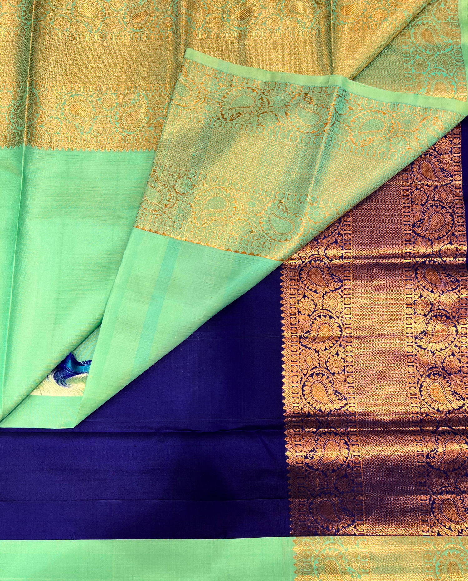 Luxurious Light Green Pure Silk Saree with Rich Gold Detailing